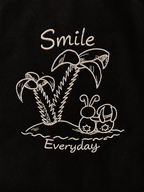 Gesticktes Smile Everyday Motiv mit Palmen auf schwarzer Canvas Tasche.